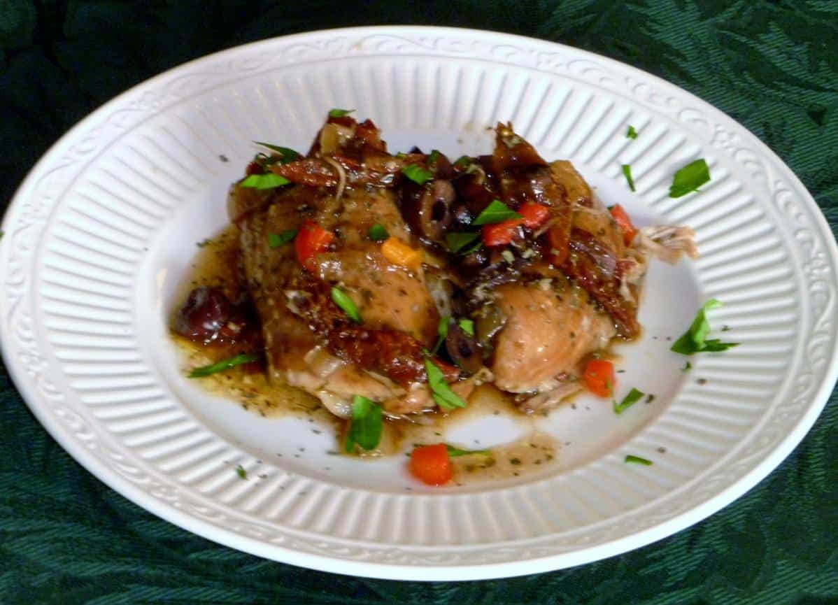  A mouthwatering aroma fills the air as the Crock Pot Corsican Chicken slowly simmers.