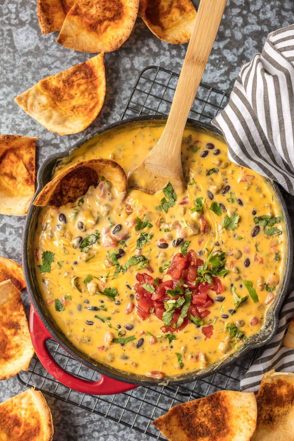  Add some spice to your life with this zesty and creamy cheese dip.