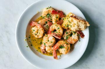  As the shrimp hit the hot pan, the aromas of garlic and lemon begin to fill the room.