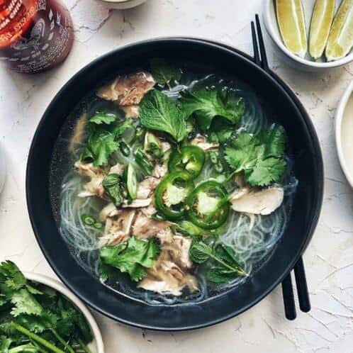 Bursting with flavors and textures: chicken, rice noodles and fresh herbs