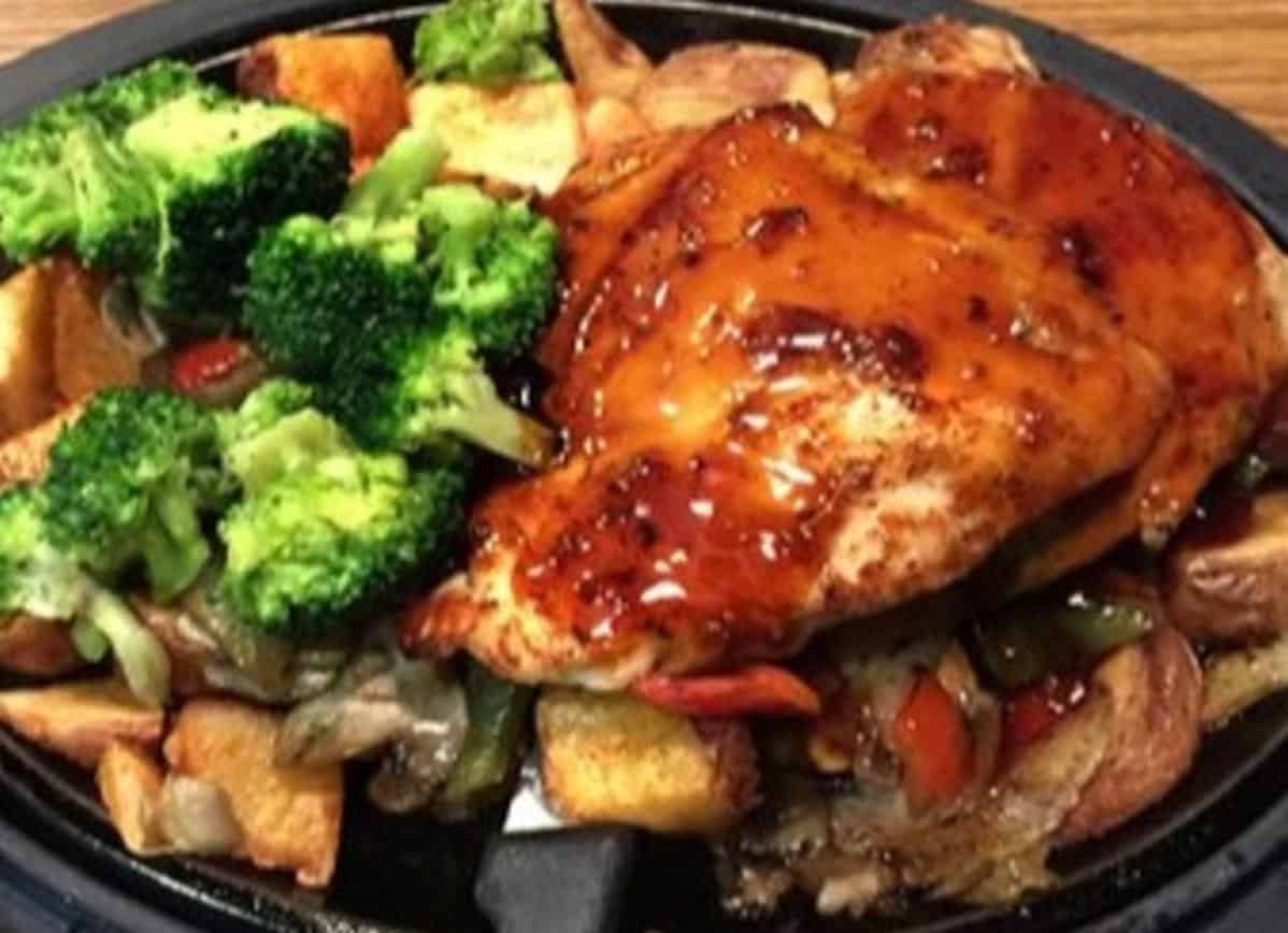  Cast iron sizzles as flavors mingle in a tasty dance.