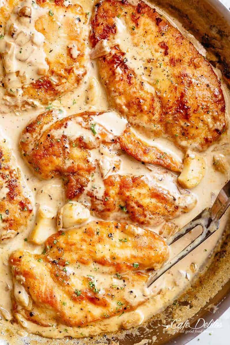  Creamy garlic sauce, melted cheese, and juicy chicken all come together in one perfect dish.