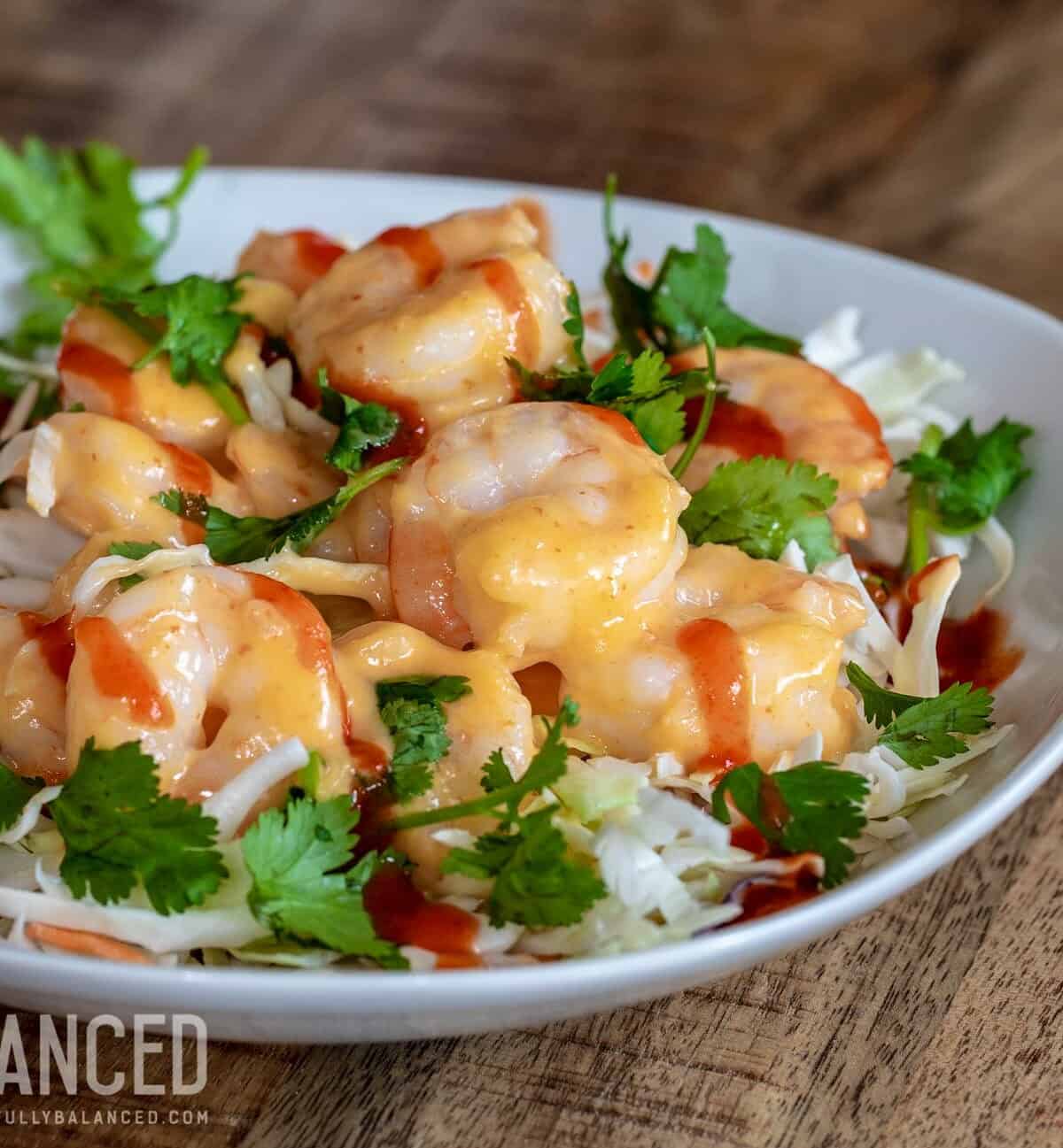  Crisp, marinated shrimp tossed with a creamy, spicy sauce