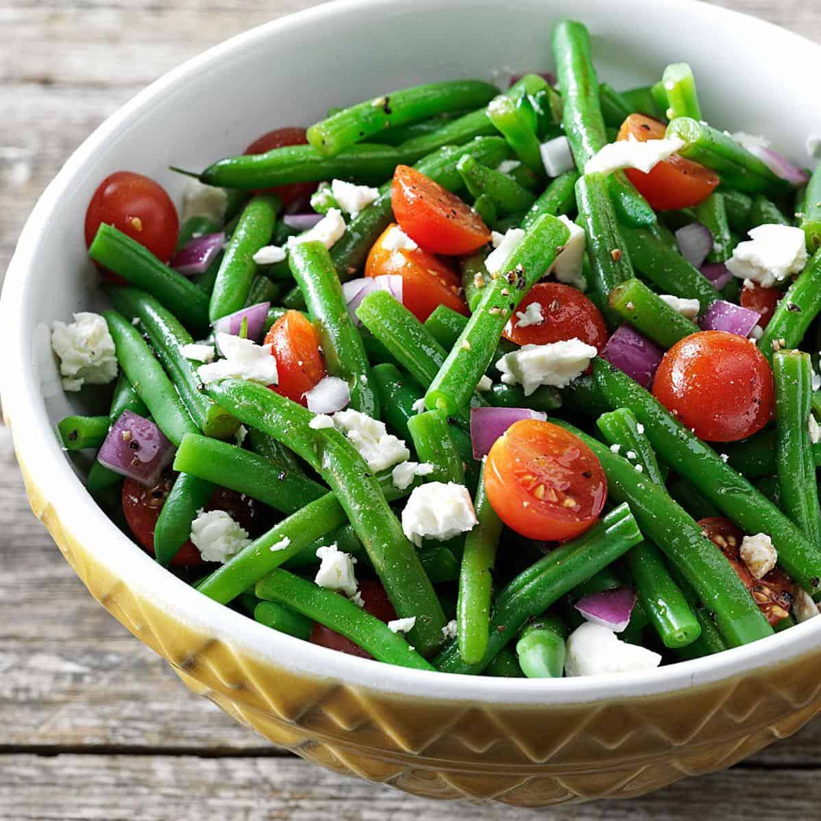  Fresh green beans are the star of this crisp and refreshing salad.