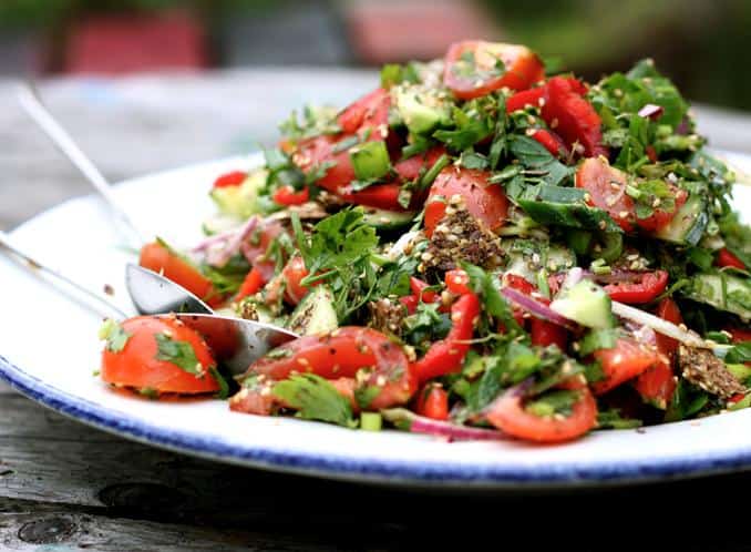  Fresh veggies and an irresistible dressing make this Middle Eastern salad worth writing home about.