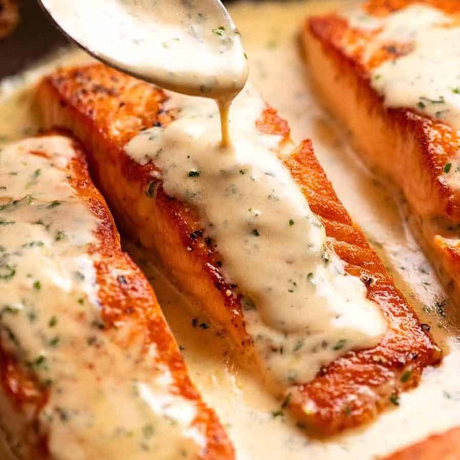  Get ready to swim in a sea of flavor with this Creamy Philly Garlic and Herb Salmon!