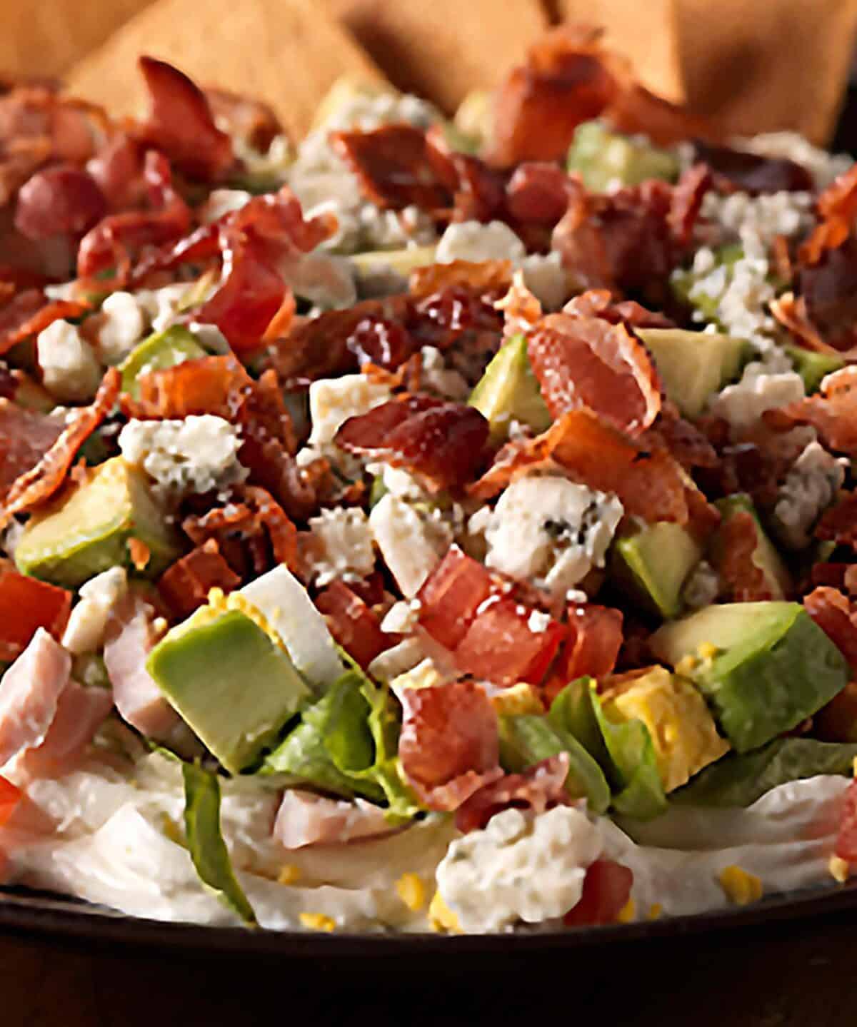  Get your party started with a quick and easy to make Cobb Salad Dip!