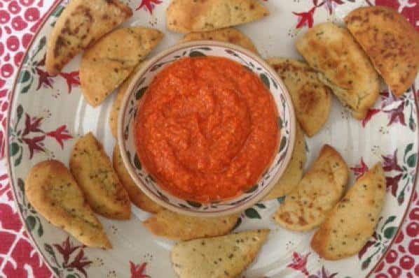  One taste of this fiery dip and you'll feel like you've been seduced by the devil himself.