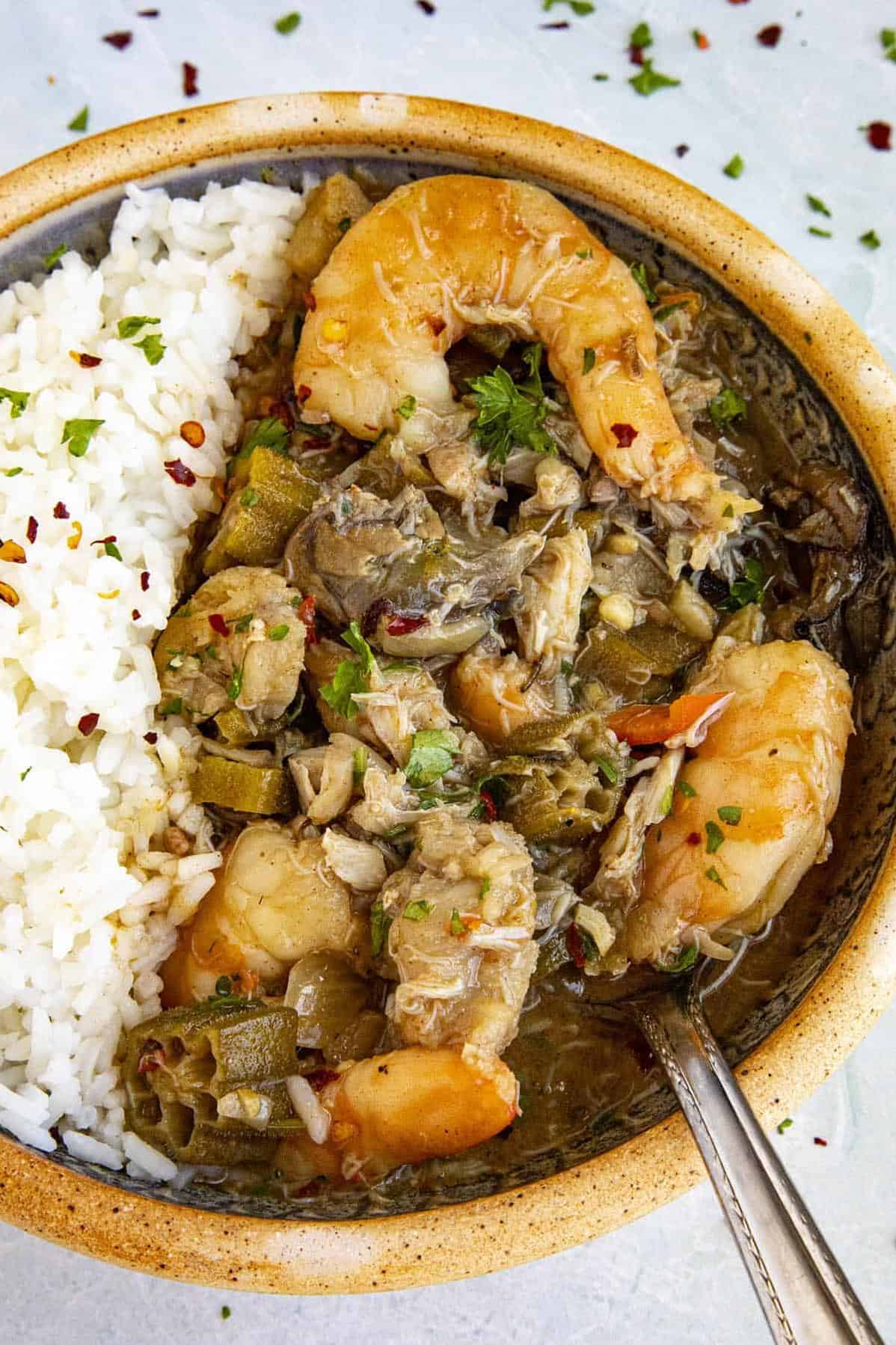  Plump and juicy shrimp and oysters swimming in a flavorful and savory bowl of gumbo