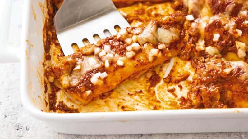  Ready for a fiesta! These chicken enchiladas are perfect for a party.