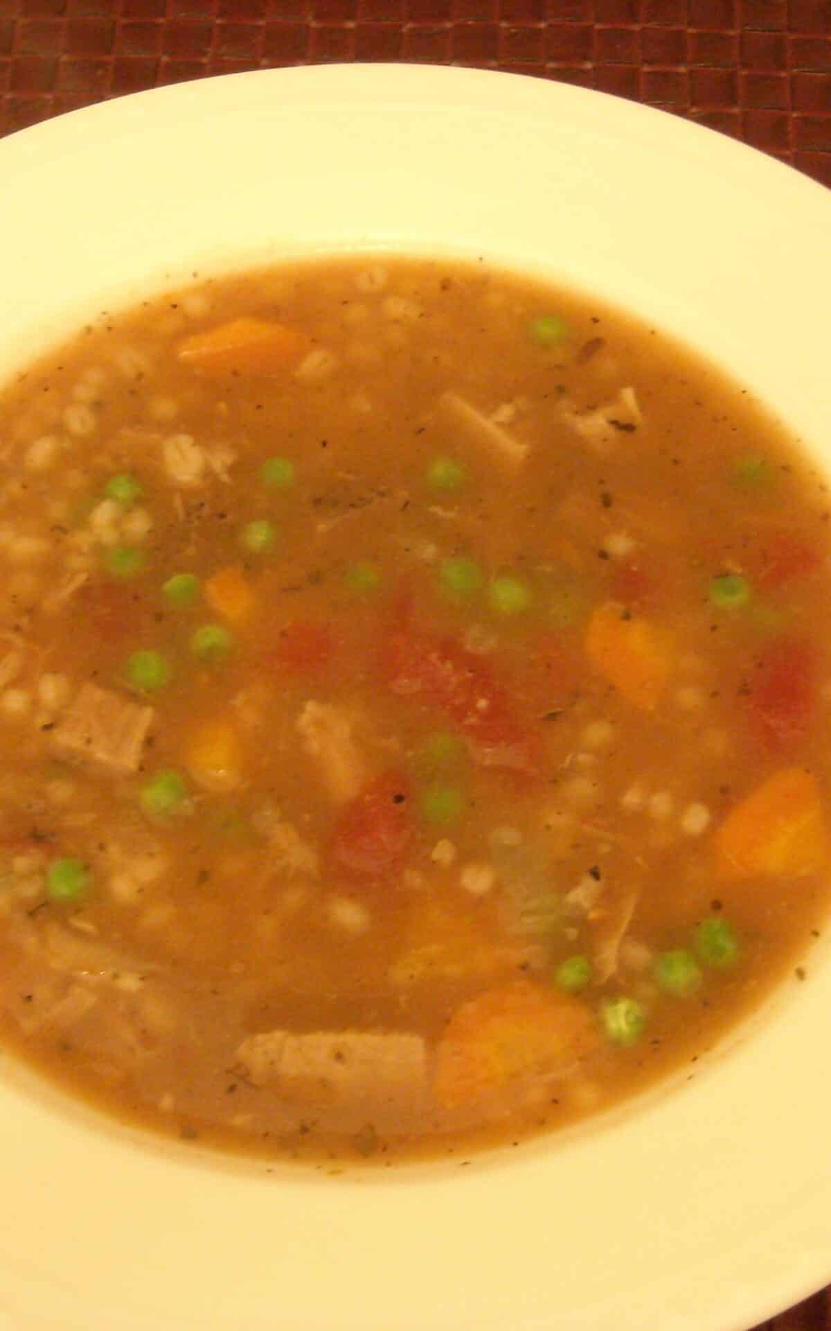  Rich beef broth, tender chunks of meat, and nutty barley come together in this hearty soup.