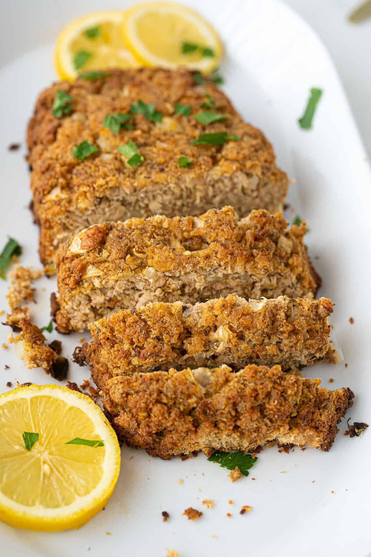  Serve up a slice of this inviting and filling salmon loaf, perfect for a cozy night in or an extravagant dinner party.
