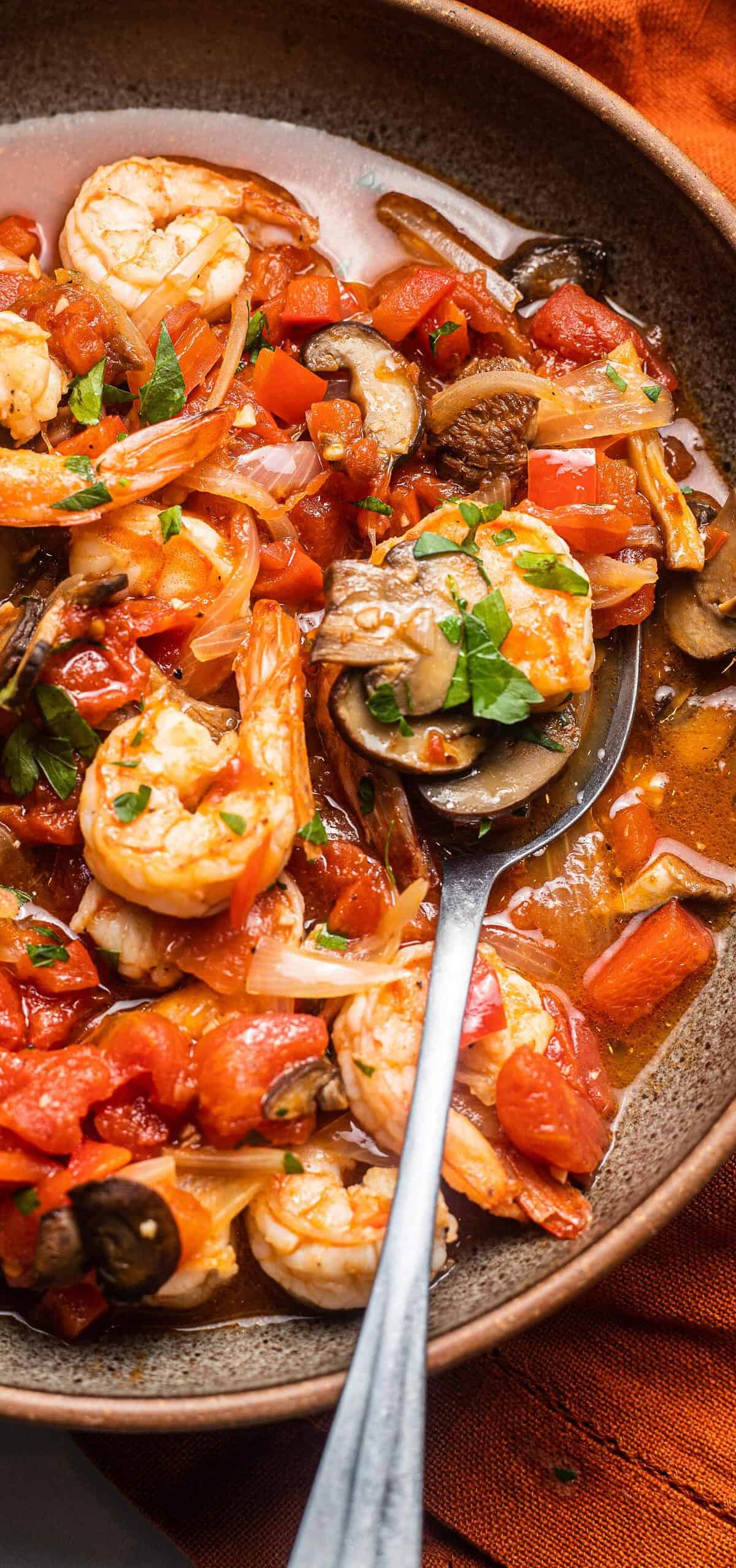  Succulent shrimp simmered in a flavorful and aromatic tomato sauce.