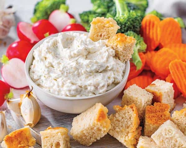  Take your chip, veggie, or cracker game to the next level with this mouthwatering dip.