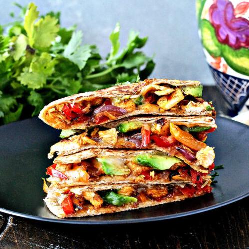  The ultimate chicken quesadilla, crispy on the outside, juicy on the inside.