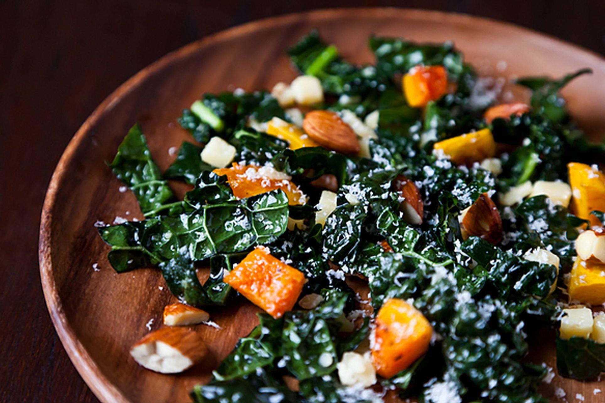  The vibrant colors and textures of this Kale & Squash Salad will make your taste buds dance!