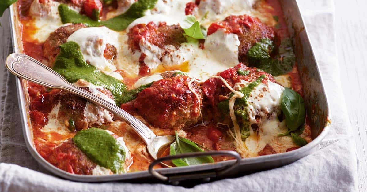  These flavorful meatballs soaked in a luscious tomato sauce will have you licking your plate clean.