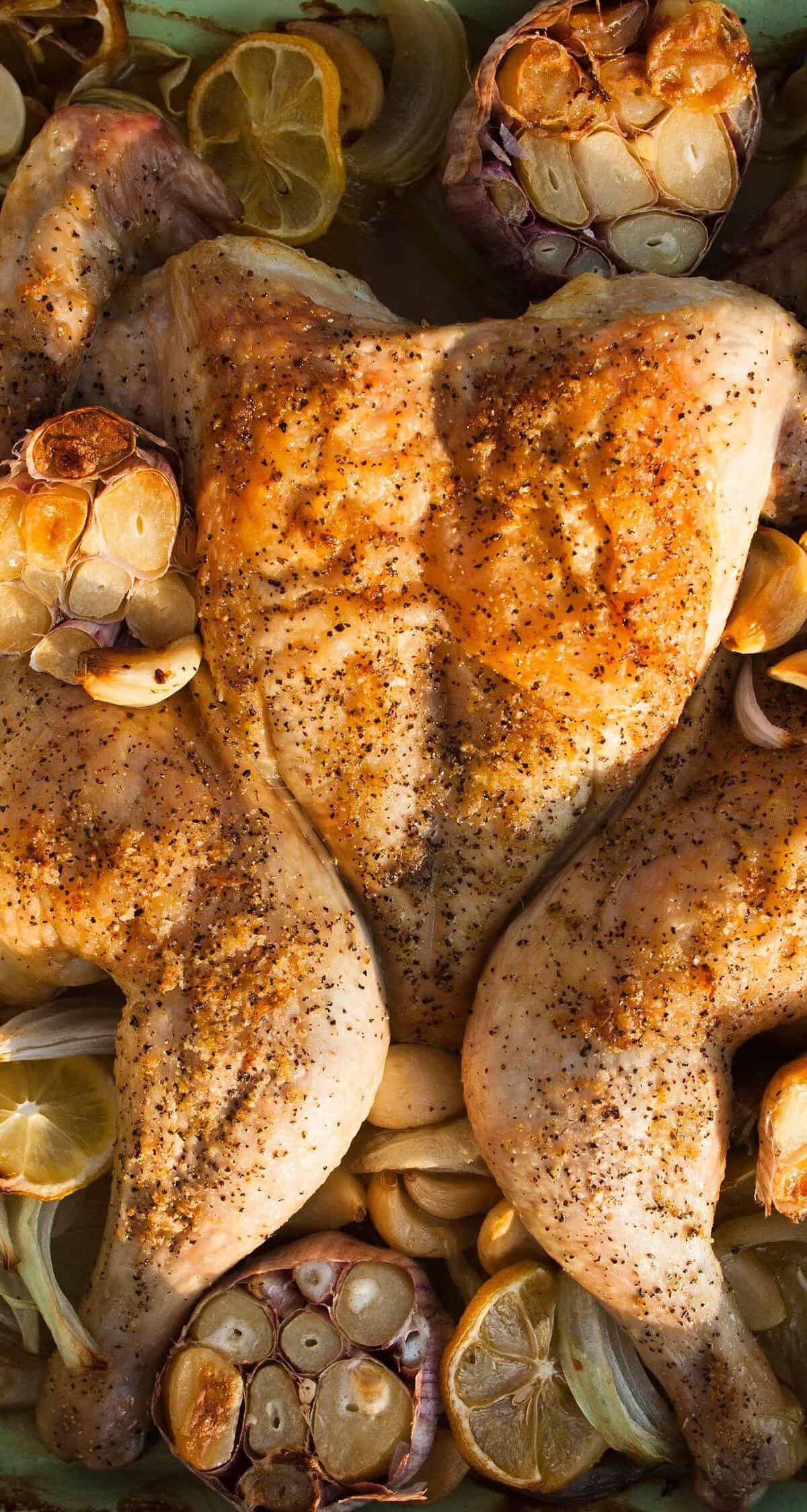  This golden roasted chicken is crispy on the outside and tender on the inside.