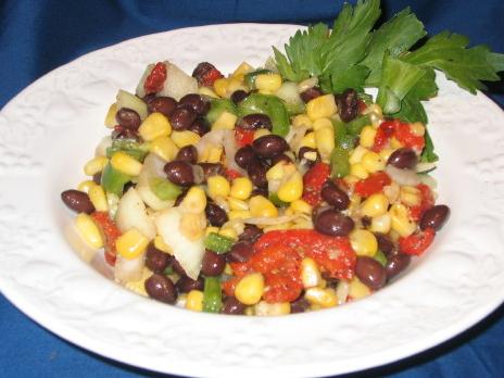  This salad is a celebration of summer produce - sweet corn, juicy tomatoes, and crisp bell peppers.