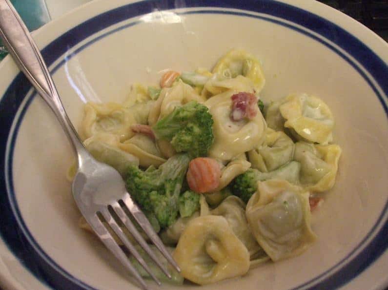  This salad is a perfect balance of fresh greens and cheesy tortellini.