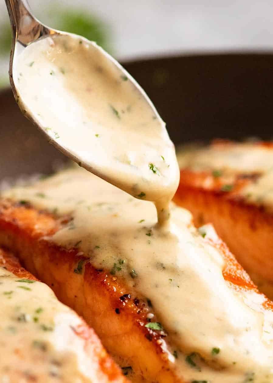  This salmon is sure to make anyone hooked on its creamy and herb-filled goodness!